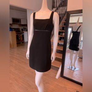 Vtg Bebe LBD size 10 sleeveless A-line style with umpire bust and square neck.